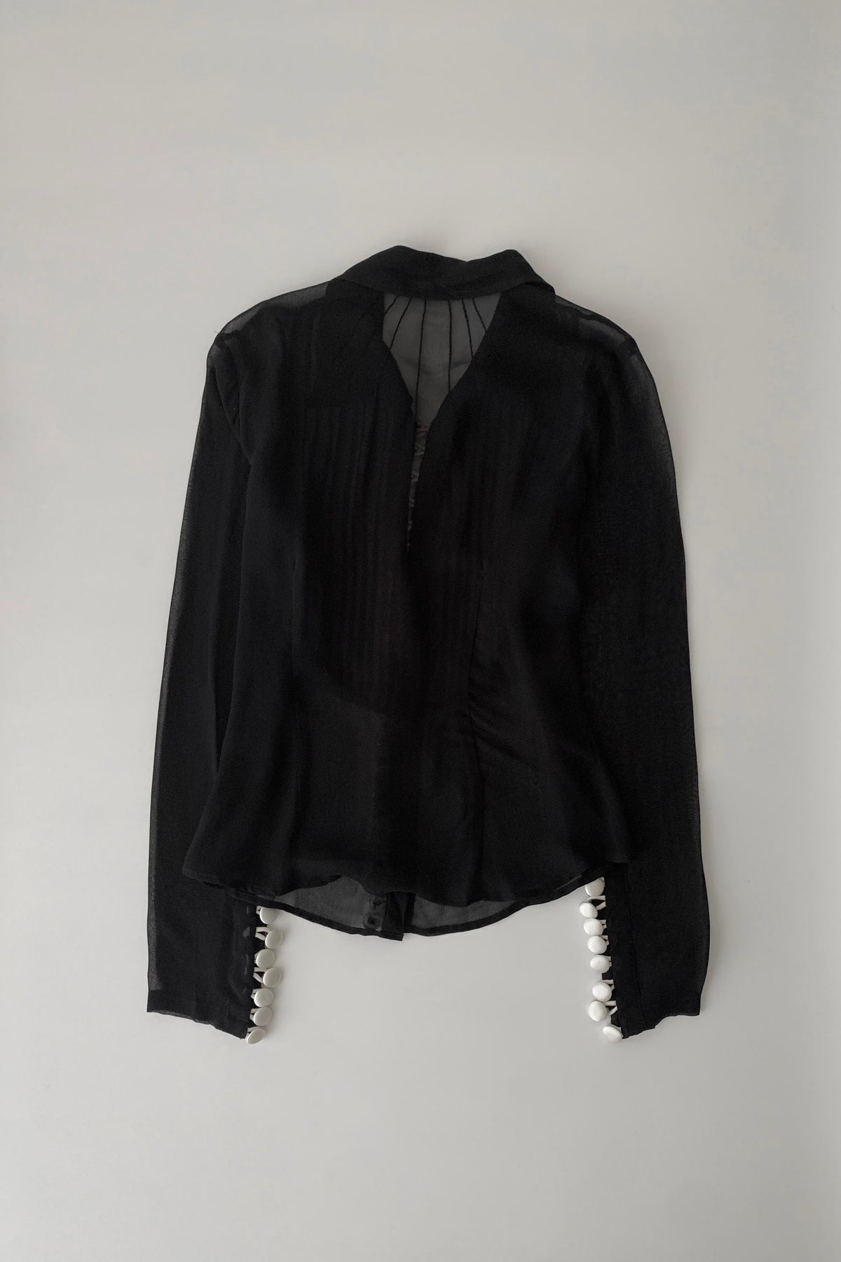 black sheer white buttons shirt