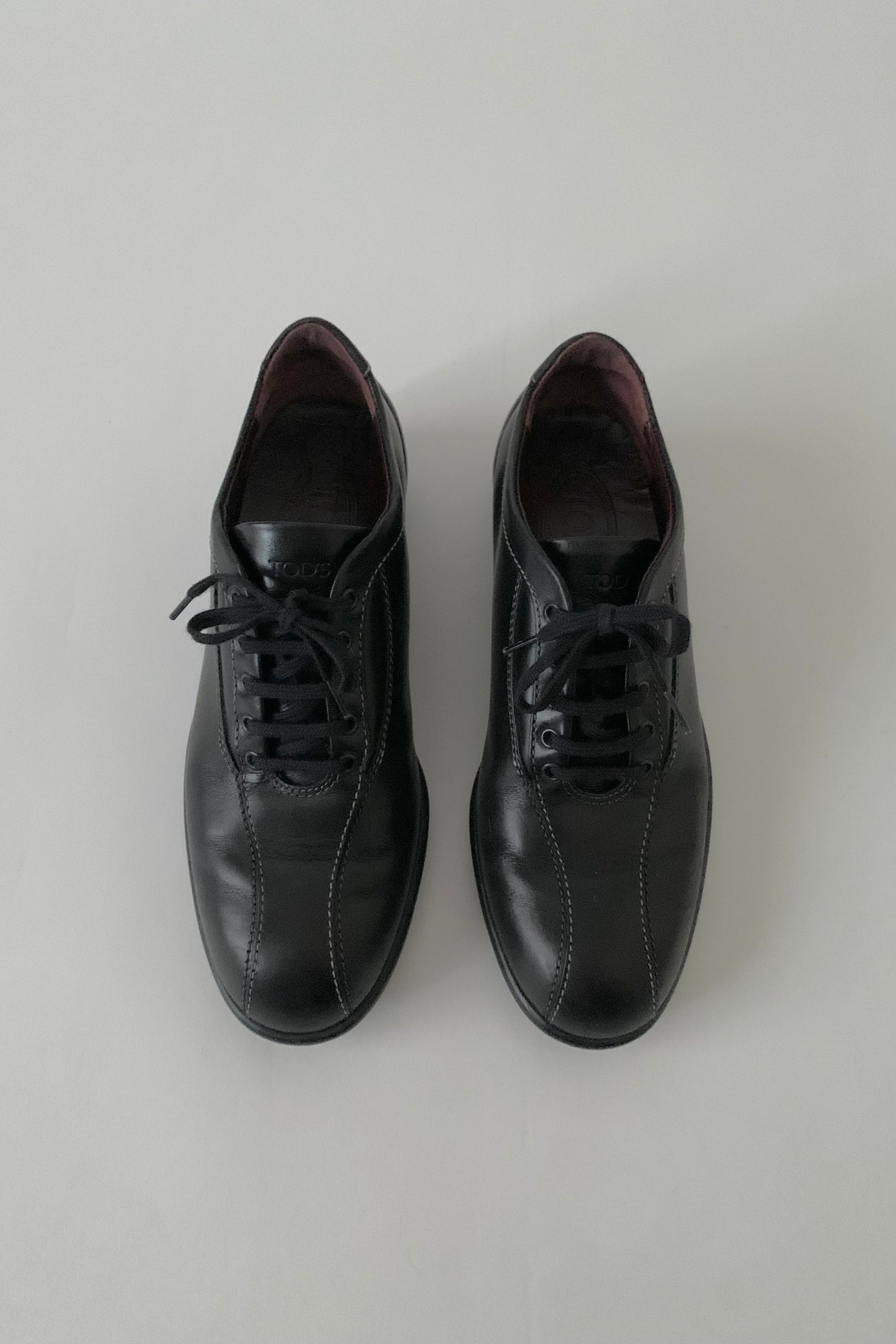 TOD’S black leather sneakers
