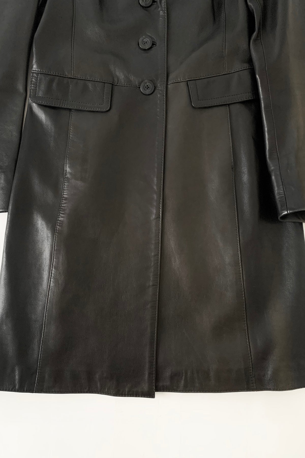 black aging leather coat