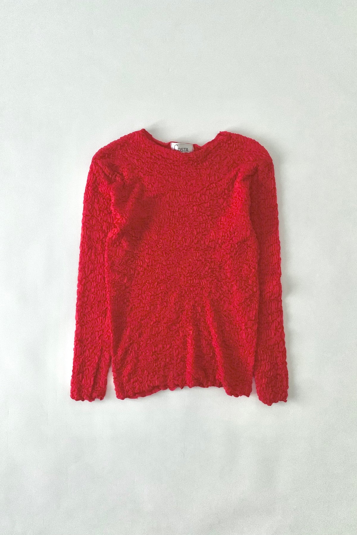 red ruffed long sleeve tops