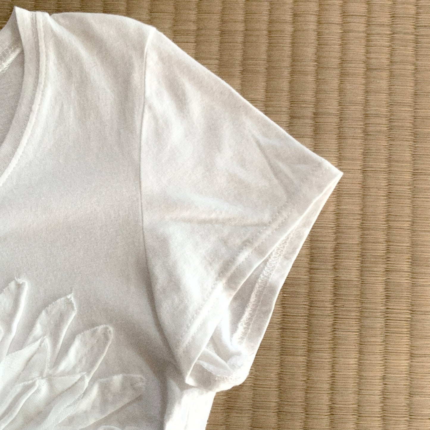 white flower icon T tops