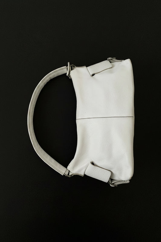 white leather side design bag