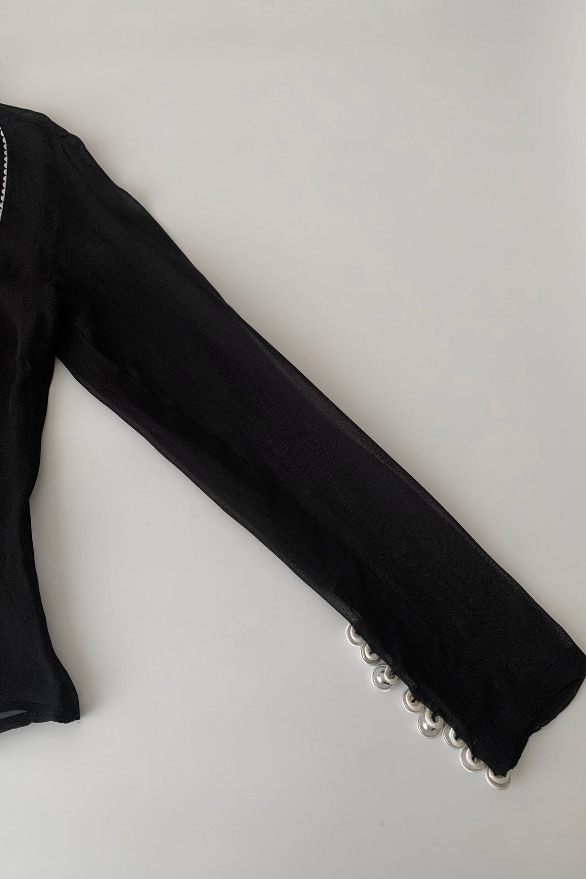 black sheer white buttons shirt
