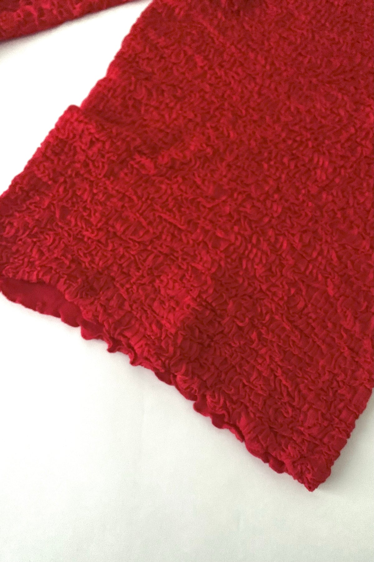 red ruffed long sleeve tops