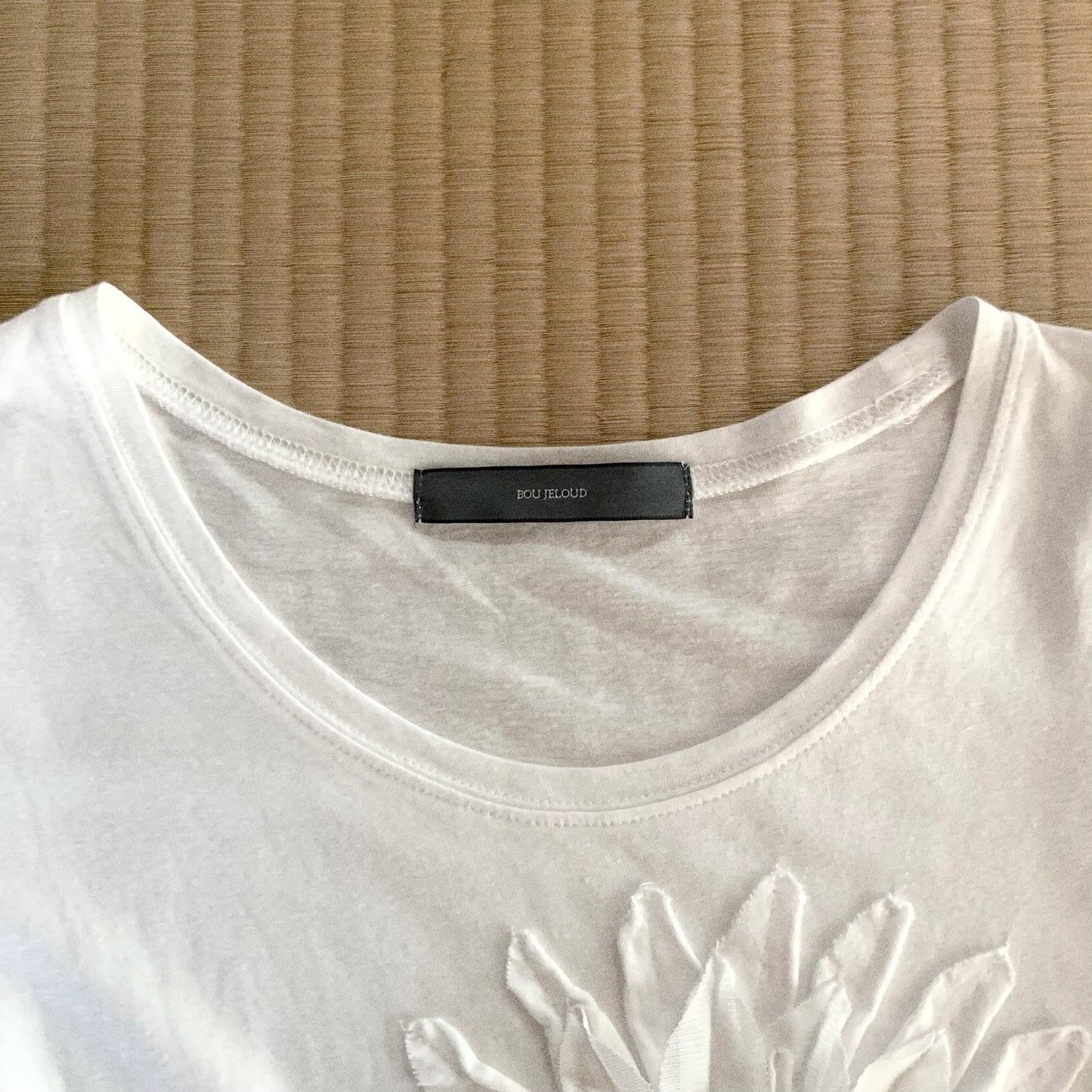 white flower icon T tops