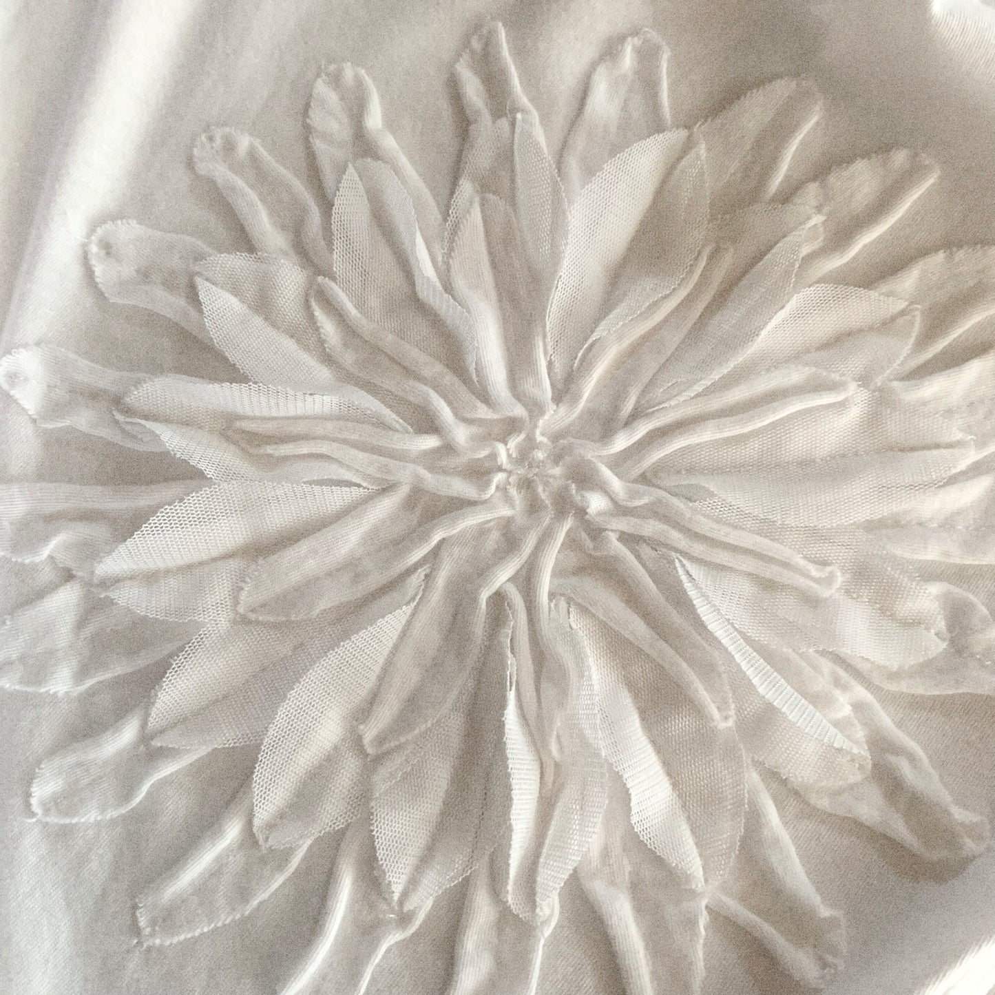 white flower icon T tops