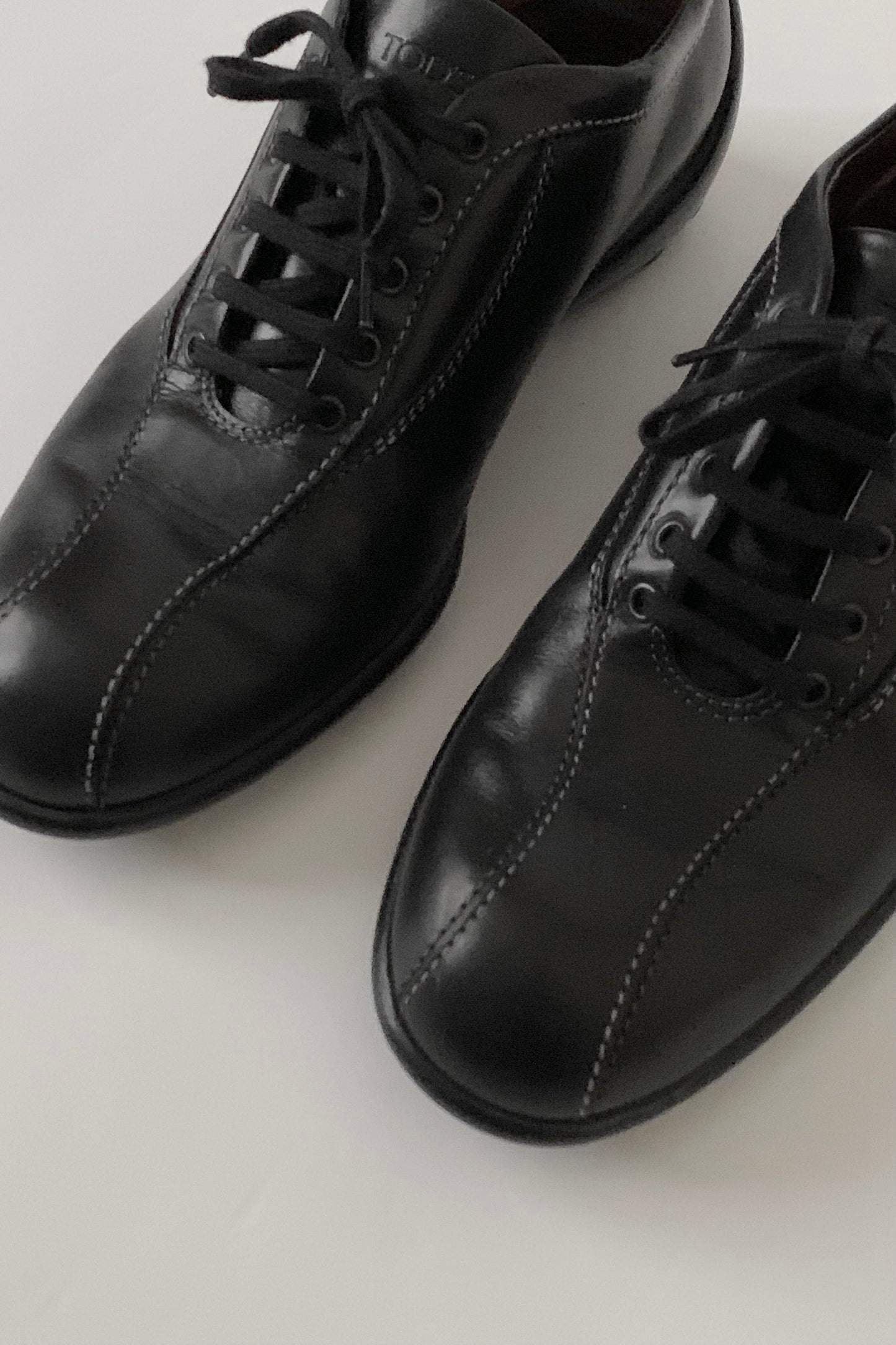 TOD’S black leather sneakers