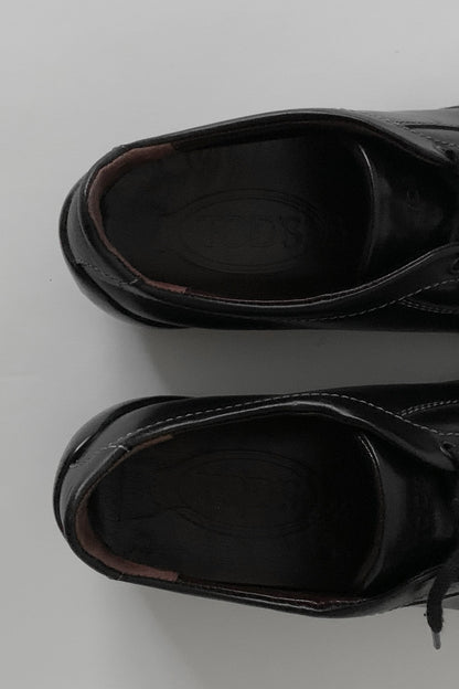TOD’S black leather sneakers