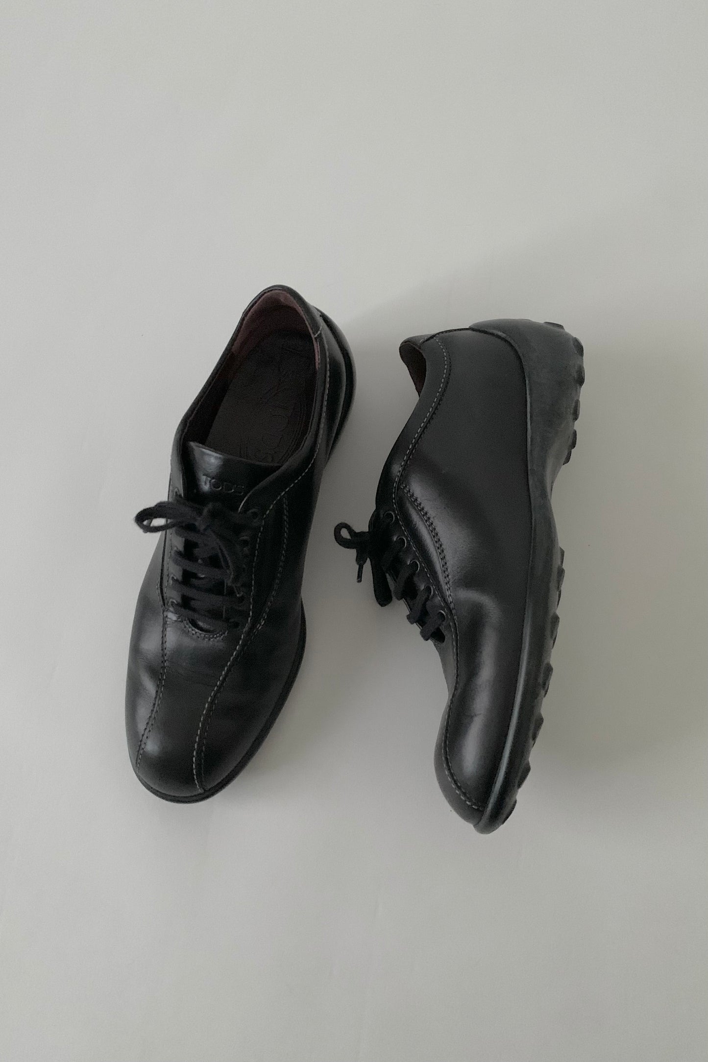 TOD’S black leather sneakers