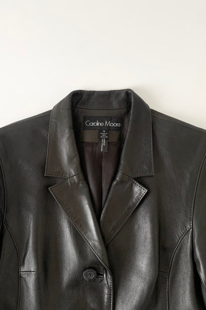 black aging leather coat