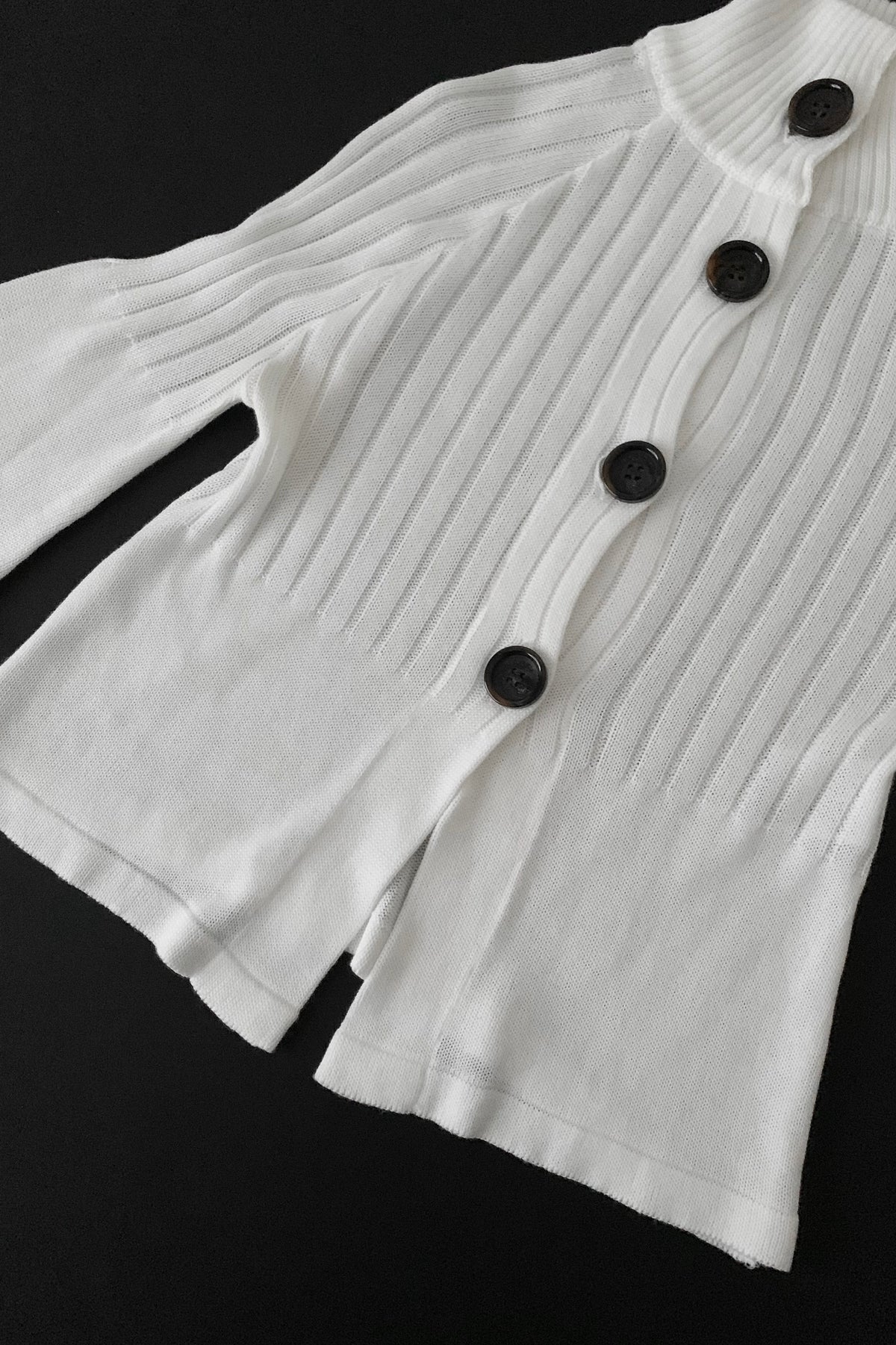 black buttons kint poncho