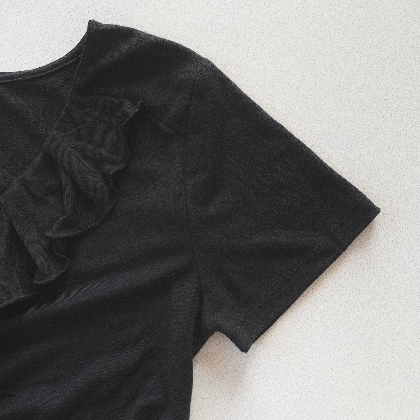 black center frill T tops