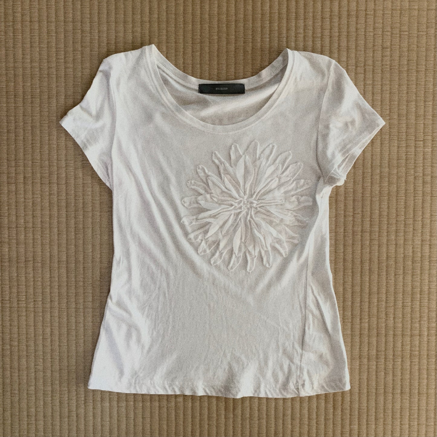 white flower icon T tops
